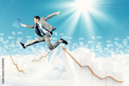 Photo: Image of jumping businessman Image of jumping businessman