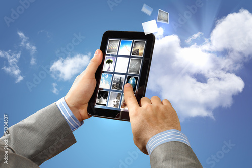 Photo: Image of hands touching pad Image of hands touching pad