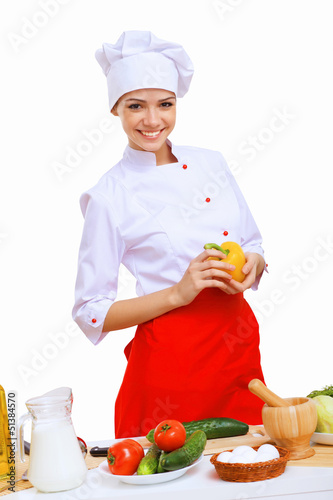 Photo: Young cook preparing food Young cook preparing food