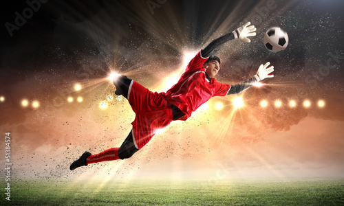 Photo: Goalkeeper catches the ball Goalkeeper catches the ball