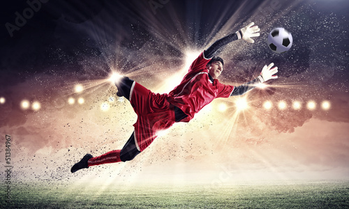 Photo: Goalkeeper catches the ball Goalkeeper catches the ball