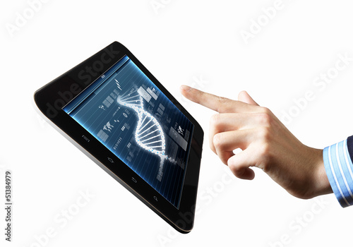 Photo: Dna strand On The Tablet Screen Dna strand On The Tablet Screen
