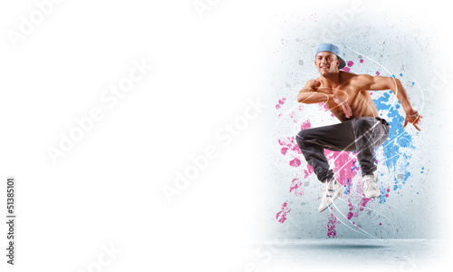 Photo: young man dancing hip hop with color lines young man dancing hip hop with color lines