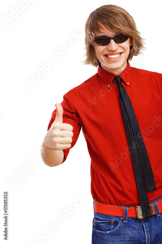 Photo: Happy smiling young man dancing Happy smiling young man dancing
