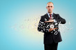 Business man holding alarmclock