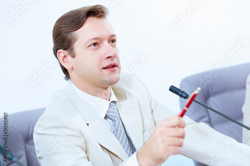 Photo: Businessman at meeting Businessman at meeting