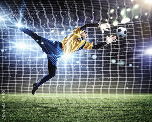 Photo: Goalkeeper catches the ball Goalkeeper catches the ball