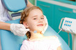 Little girl visiting dentist