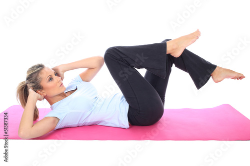 Photo: Woman Exercising Woman Exercising