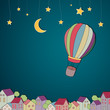 Vector Illustration of an Hot-Air Balloon Flying over a Town