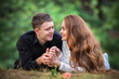 Love and affection between a young couple at the park