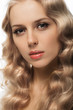 beautiful blonde girl on white background close-up