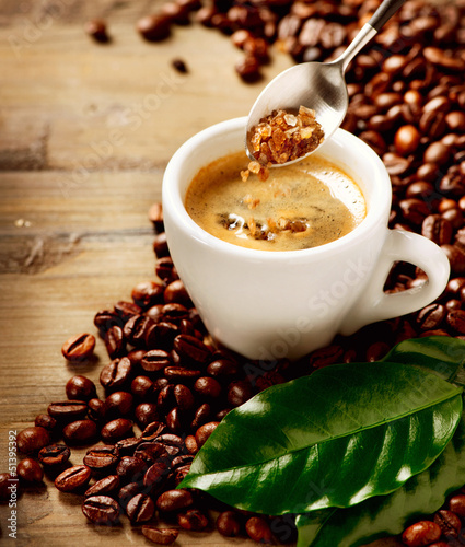 Photo: Coffee Espresso. Cup Of Coffee and Brown Sugar Coffee Espresso. Cup Of Coffee and Brown Sugar