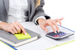 Hands working on the calculator