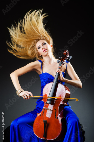 Photo: Attractive woman with cello in studio Attractive woman with cello in studio