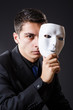 Man with mask in the dark