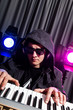 DJ mixing music at disco