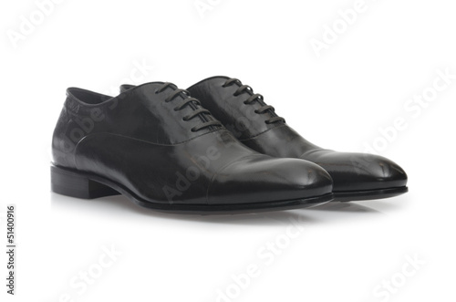 Photo: Fashion concept with male shoes on white Fashion concept with male shoes on white
