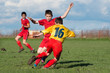 boys  kicking football