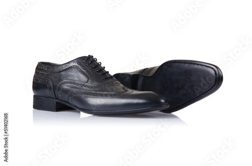 Photo: Fashion concept with male shoes on white Fashion concept with male shoes on white