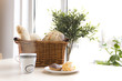 Bread, pastry and coffee cup