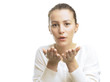 Photo: Portrait of a woman sending a kiss on white background Portrait of a woman sending a kiss on white background