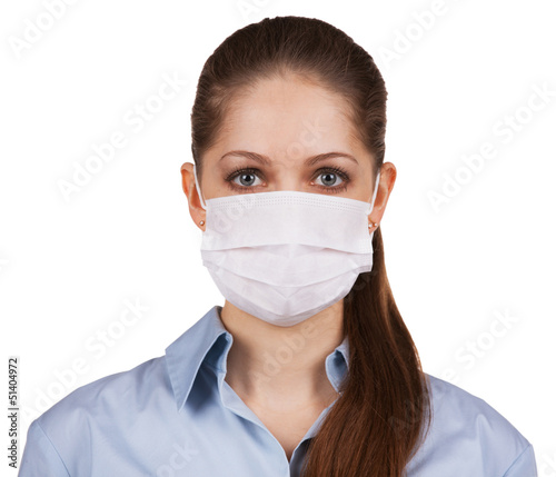 Photo: Young woman in protective medical mask Young woman in protective medical mask