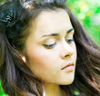Photo: sensual portrait of young lady enjoying in summer park sensual portrait of young lady enjoying in summer park