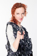 Young and beautiful woman with a gun