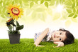 Cute girl and sunflower