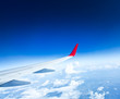 Classic image through aircraft window onto jet engine