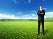Foto: businessman on spring field businessman on spring field