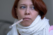 A woman with a thermometer