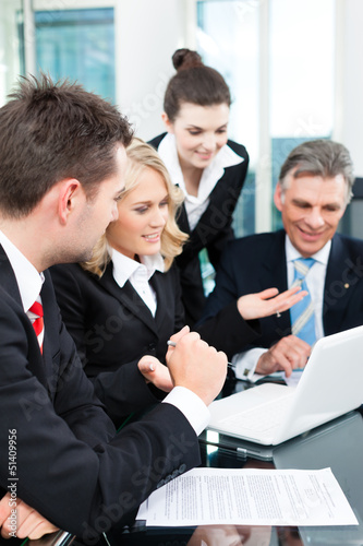 Photo: Business - successful meeting in an office Business - successful meeting in an office
