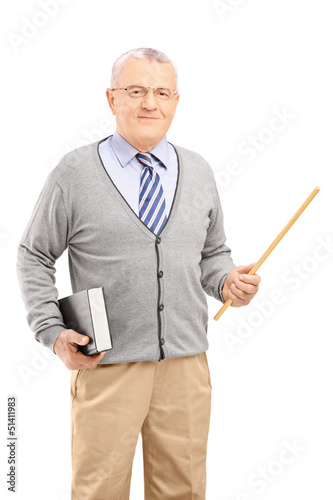 Photo: A male teacher holding a wand and a book A male teacher holding a wand and a book