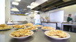 fried steaks on the plates in the kitchen