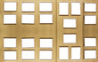 Set of vintage golden picture frames, isolated over wood