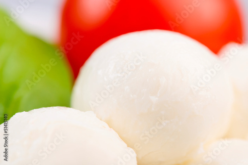 Photo: cherry tomato, mozzarella cheese and basil leaf cherry tomato, mozzarella cheese and basil leaf