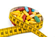 Tabletten und Maßband