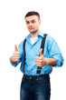 Young man showing thumbs up