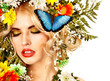 Photo: Woman with butterfly and flower. Woman with butterfly and flower.