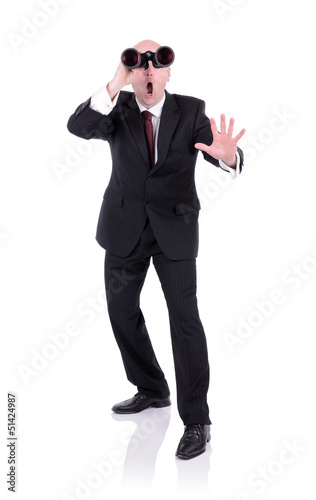 Photo: surprised businessman with Binoculars surprised businessman with Binoculars