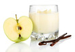 Delicious yogurt in glass with apple isolated on white