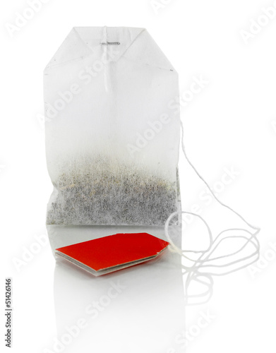 Photo: Tea bag isolated on white. Tea bag isolated on white.