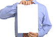 Businessman holding white paper