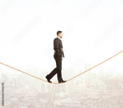 Photo: man walking on rope man walking on rope