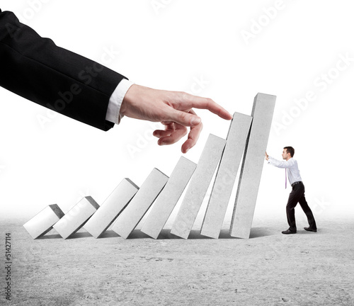 Photo: businessman holding columns businessman holding columns