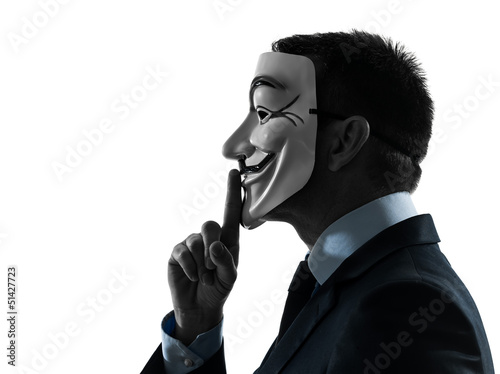 Photo: man masked anonymous group member hushing silhouette portrait man masked anonymous group member hushing silhouette portrait