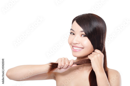 Photo: young woman happy touch her hair young woman happy touch her hair