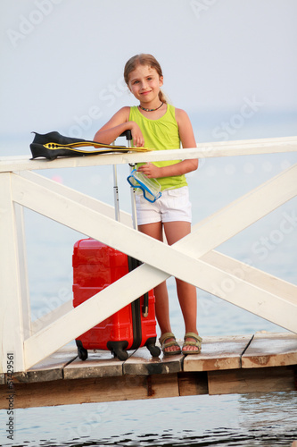 Photo: Traveler, summer - lovely girl ready for summer vacation Traveler, summer - lovely girl ready for summer vacation